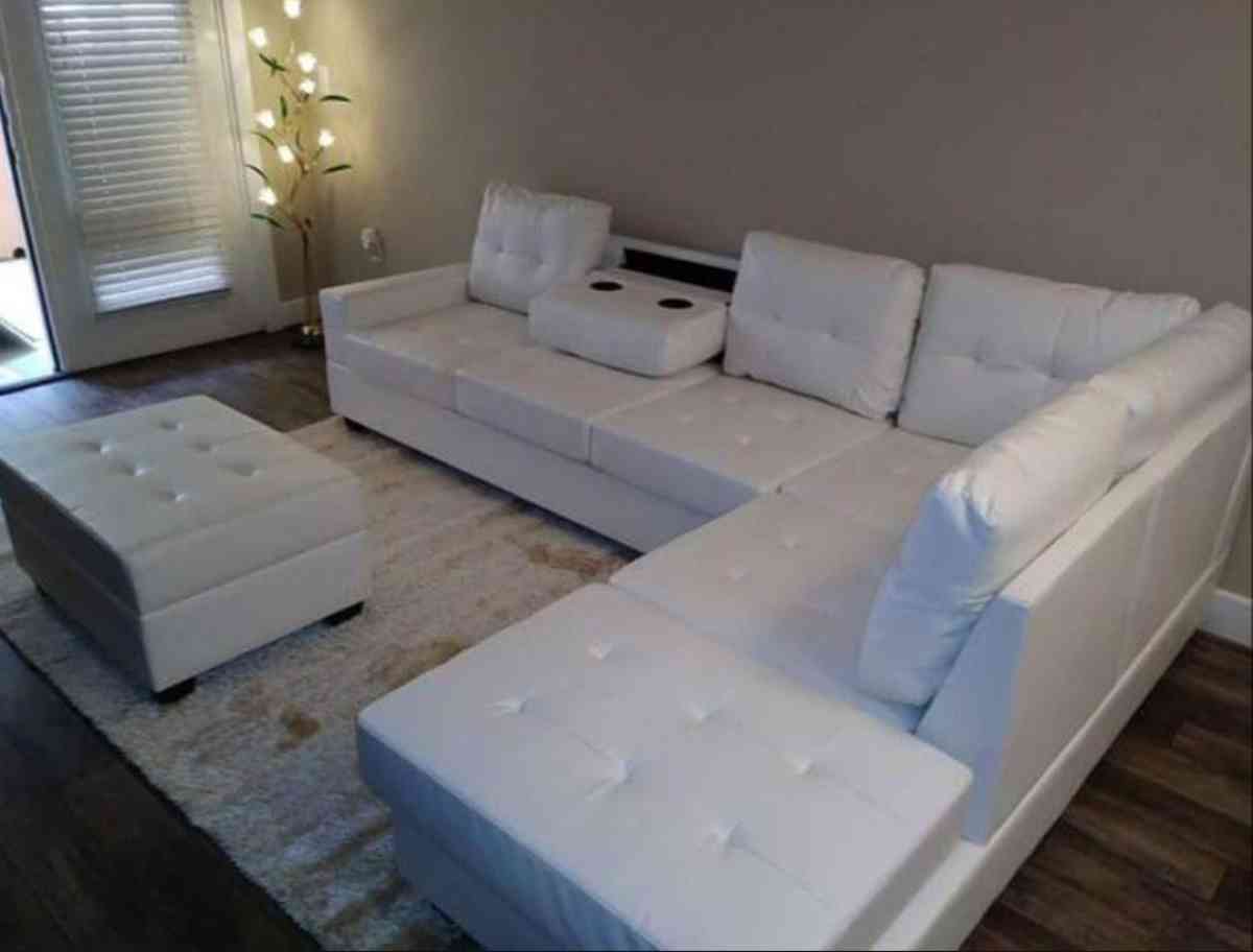 white Faux Leather Sectional with storage ottoman - Houston, Texas