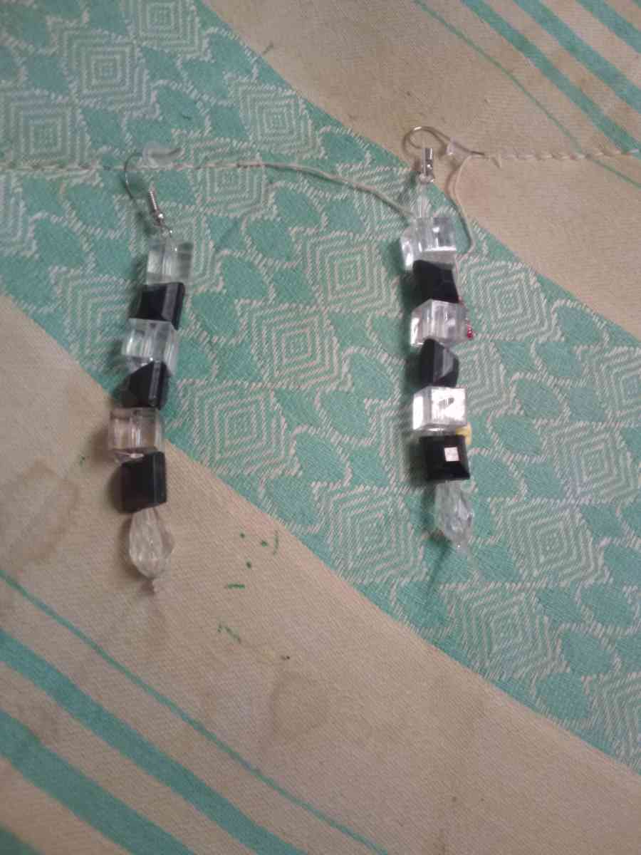 a religious wall hanging and two pairs of hand made earrings - Miller, South Dakota - FleaMarketBay