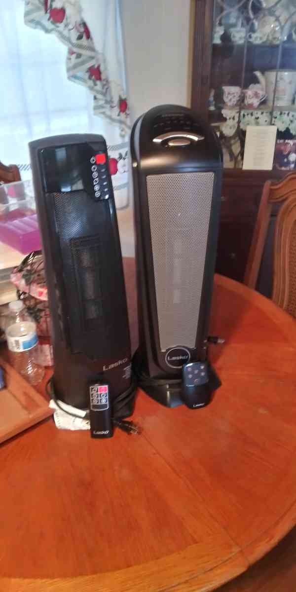 two ceramic oscillating tower heaters with remote control - Yucaipa, California - FleaMarketBay
