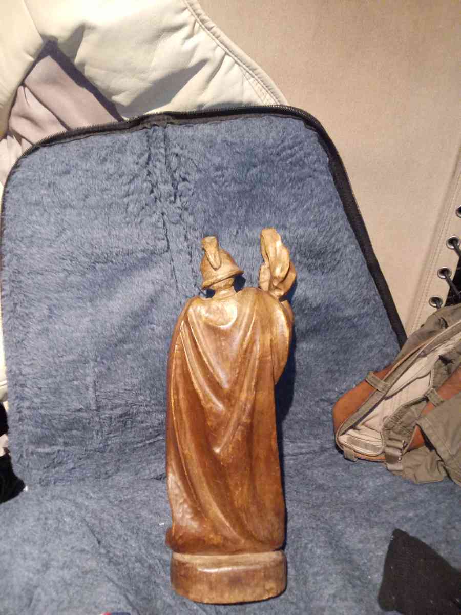 wood carving of a Roman firefighter - Tampa, Florida - FleaMarketBay