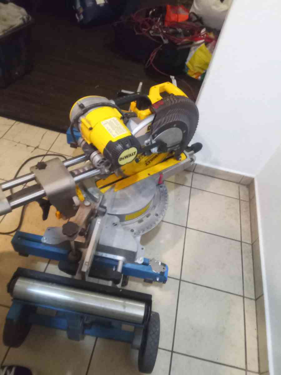 a DeWalt miter saw with table - Fresno, California - FleaMarketBay
