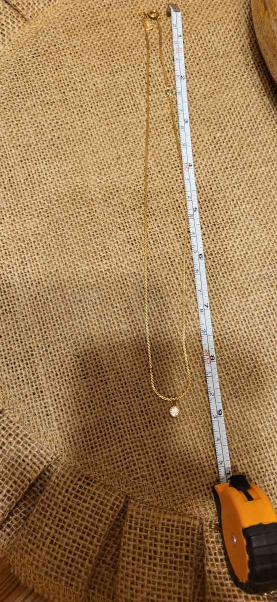 gold necklace and anklet