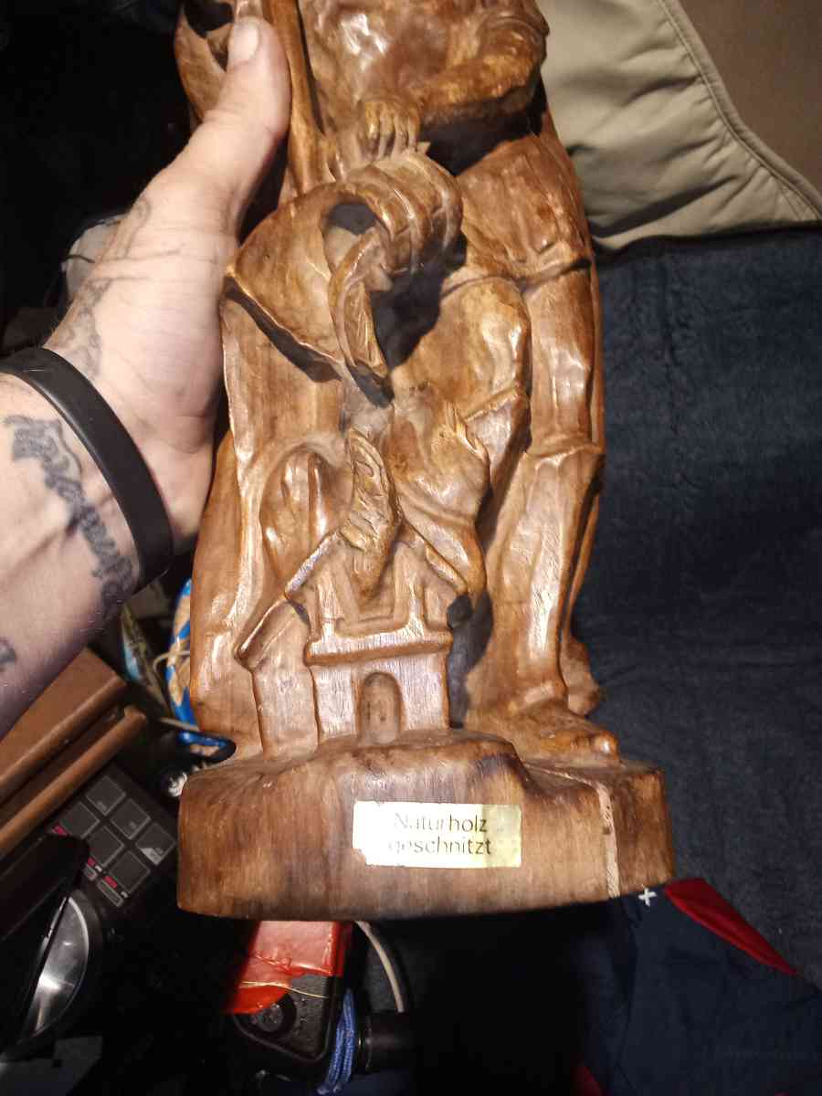 wood carving of a Roman firefighter - Tampa, Florida - FleaMarketBay