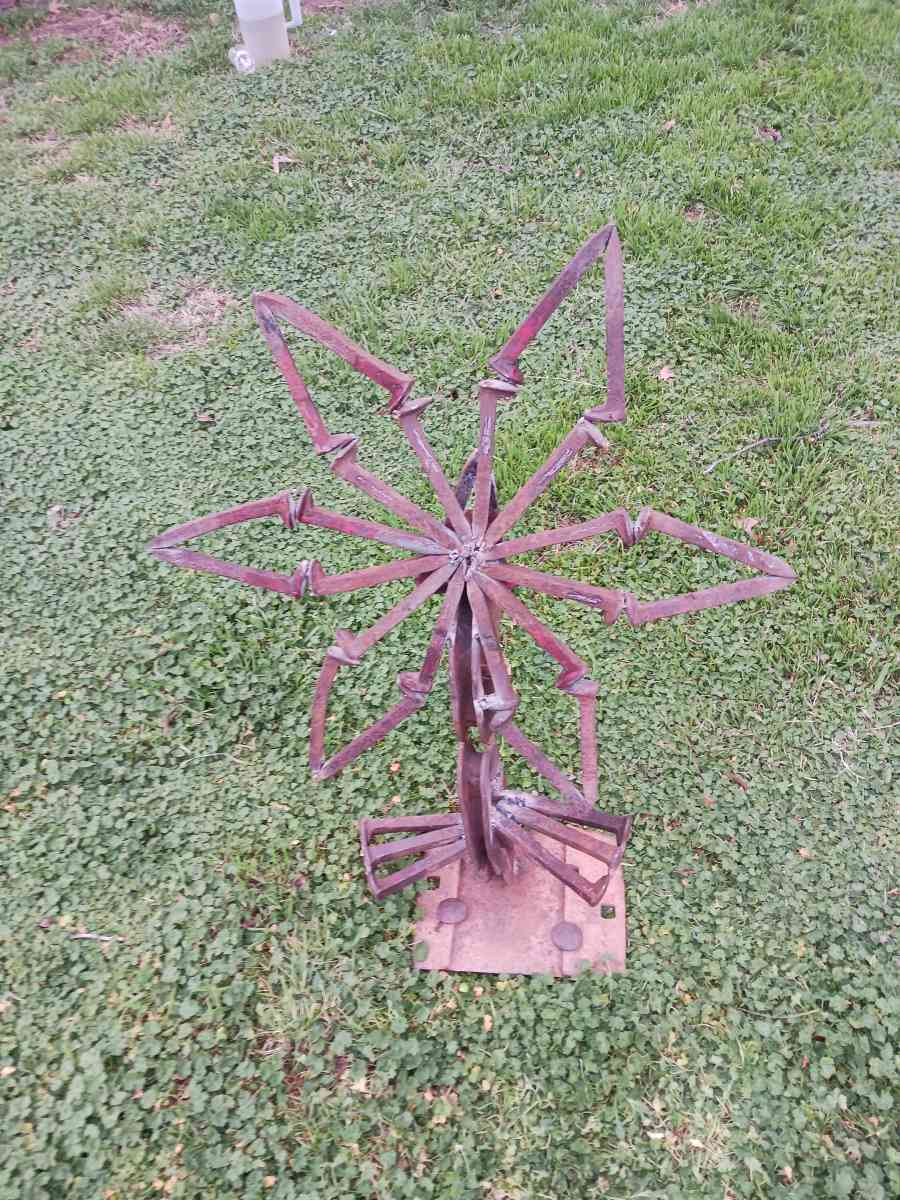 yard art flower made it out of train track spikes 65 for it - Iowa Park, Texas
