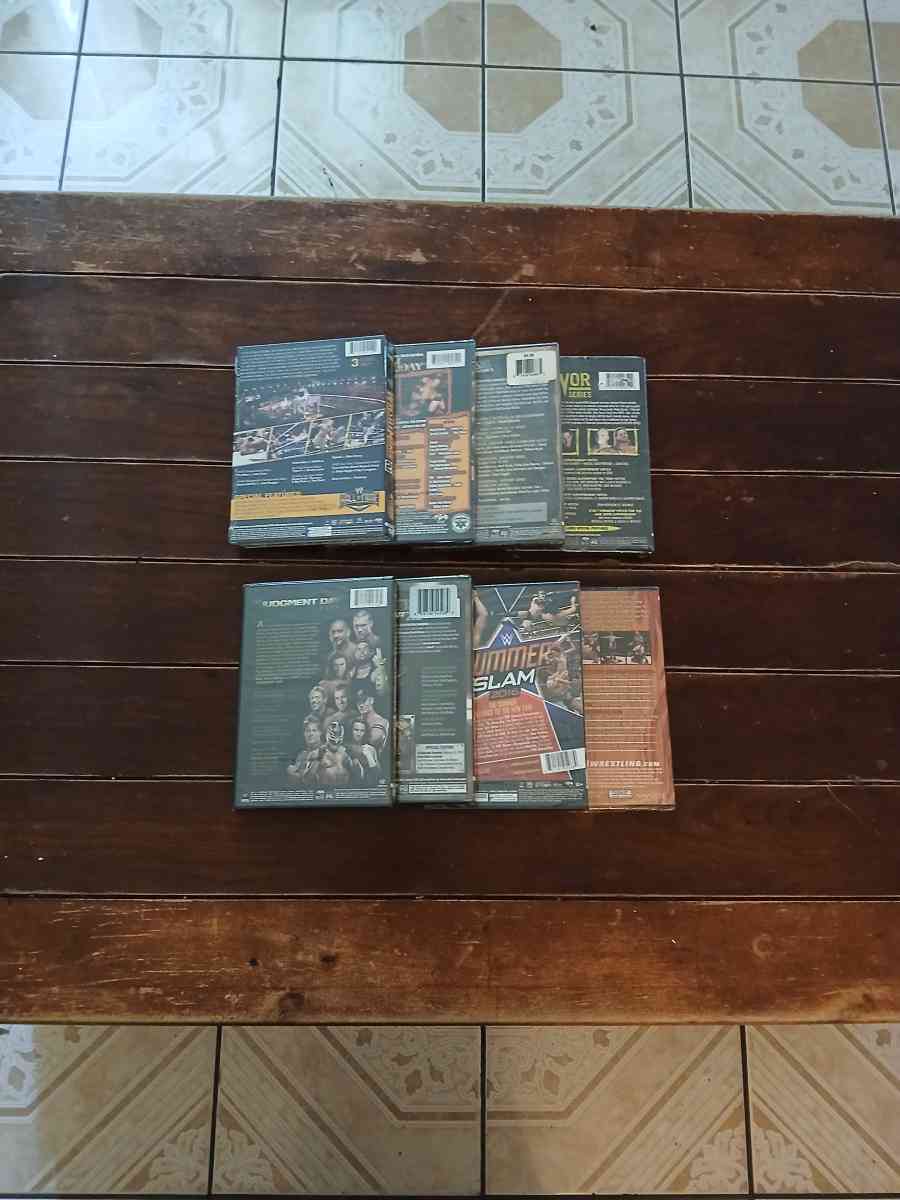 Lot Of 8 WWE And TNA DVDs - North Hollywood, California - FleaMarketBay