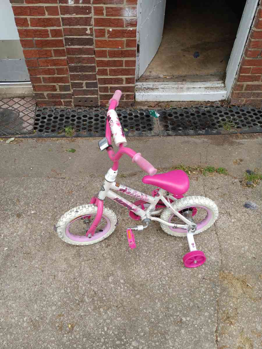 a healthy Barbie pink and white bike with training wheels - Winston Salem, North Carolina - FleaMarketBay