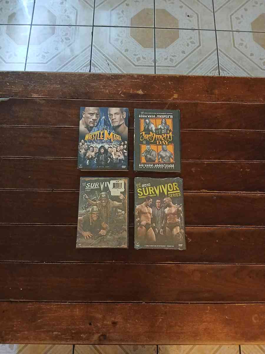 Lot Of 8 WWE And TNA DVDs - North Hollywood, California - FleaMarketBay