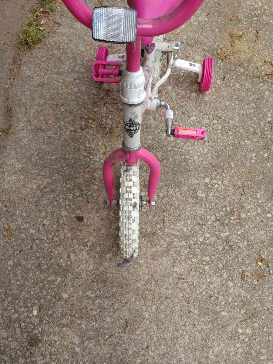 a healthy Barbie pink and white bike with training wheels - Winston Salem, North Carolina - FleaMarketBay