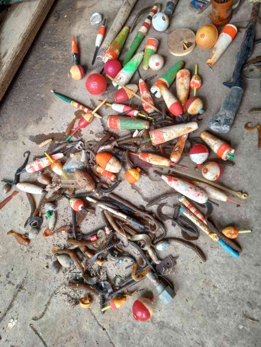 old boat parts and fishing poles and tackle - Bacliff, Texas - FleaMarketBay
