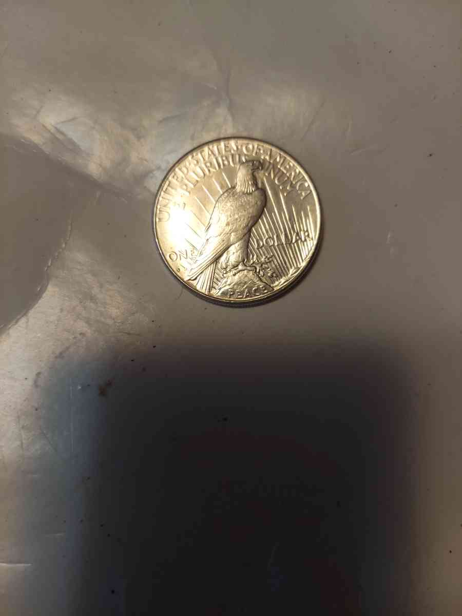 This is a nineteen twenty six s peace dollar Van four harder - Goodrich, Texas - FleaMarketBay