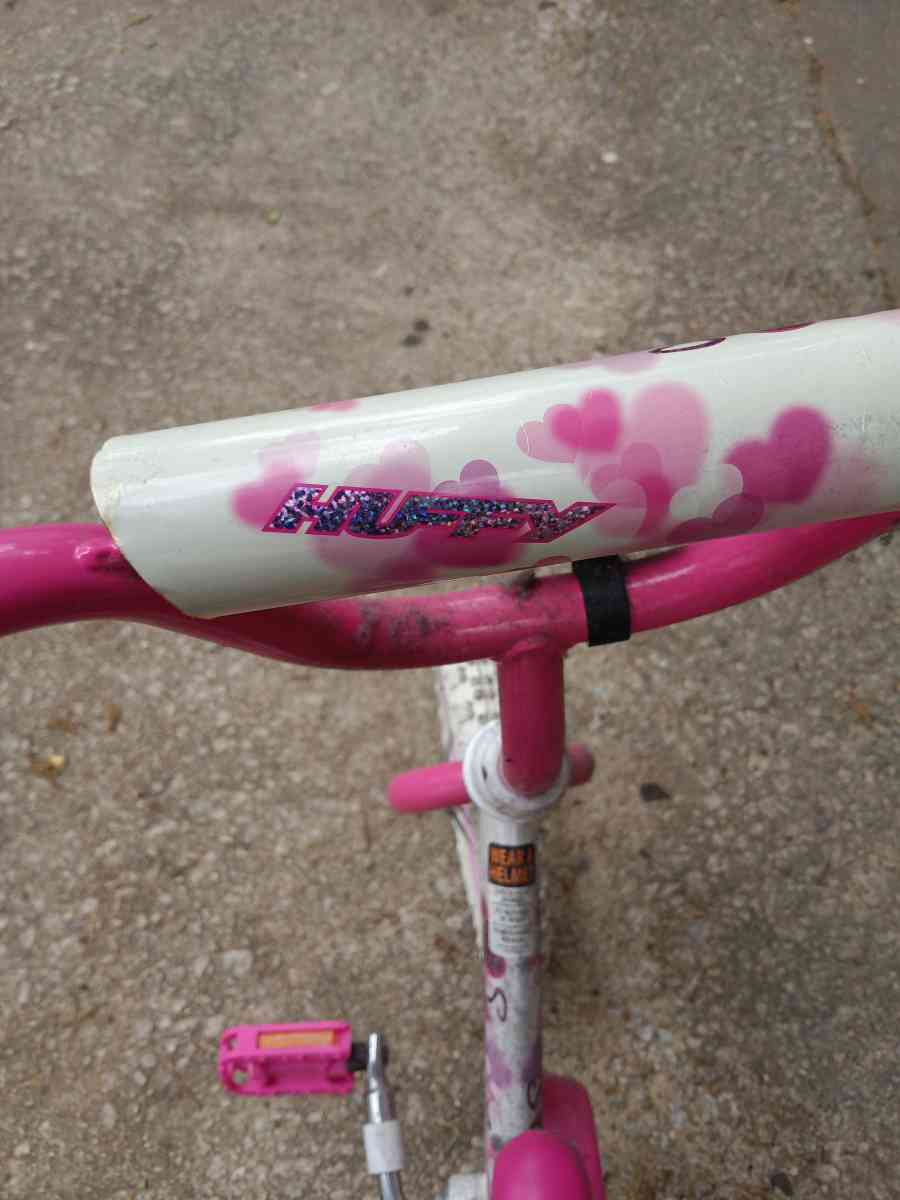 a healthy Barbie pink and white bike with training wheels - Winston Salem, North Carolina - FleaMarketBay