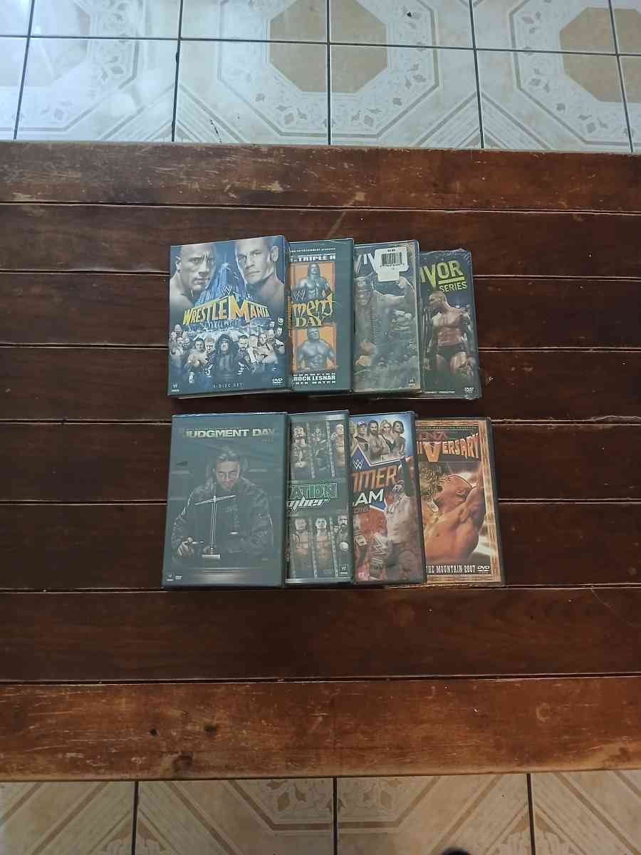 Lot Of 8 WWE And TNA DVDs - North Hollywood, California - FleaMarketBay