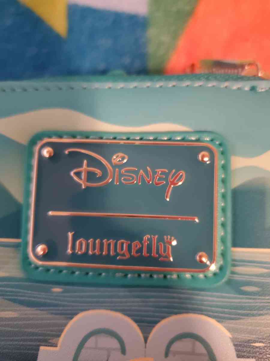 Tangled wallet - San Diego, California - FleaMarketBay