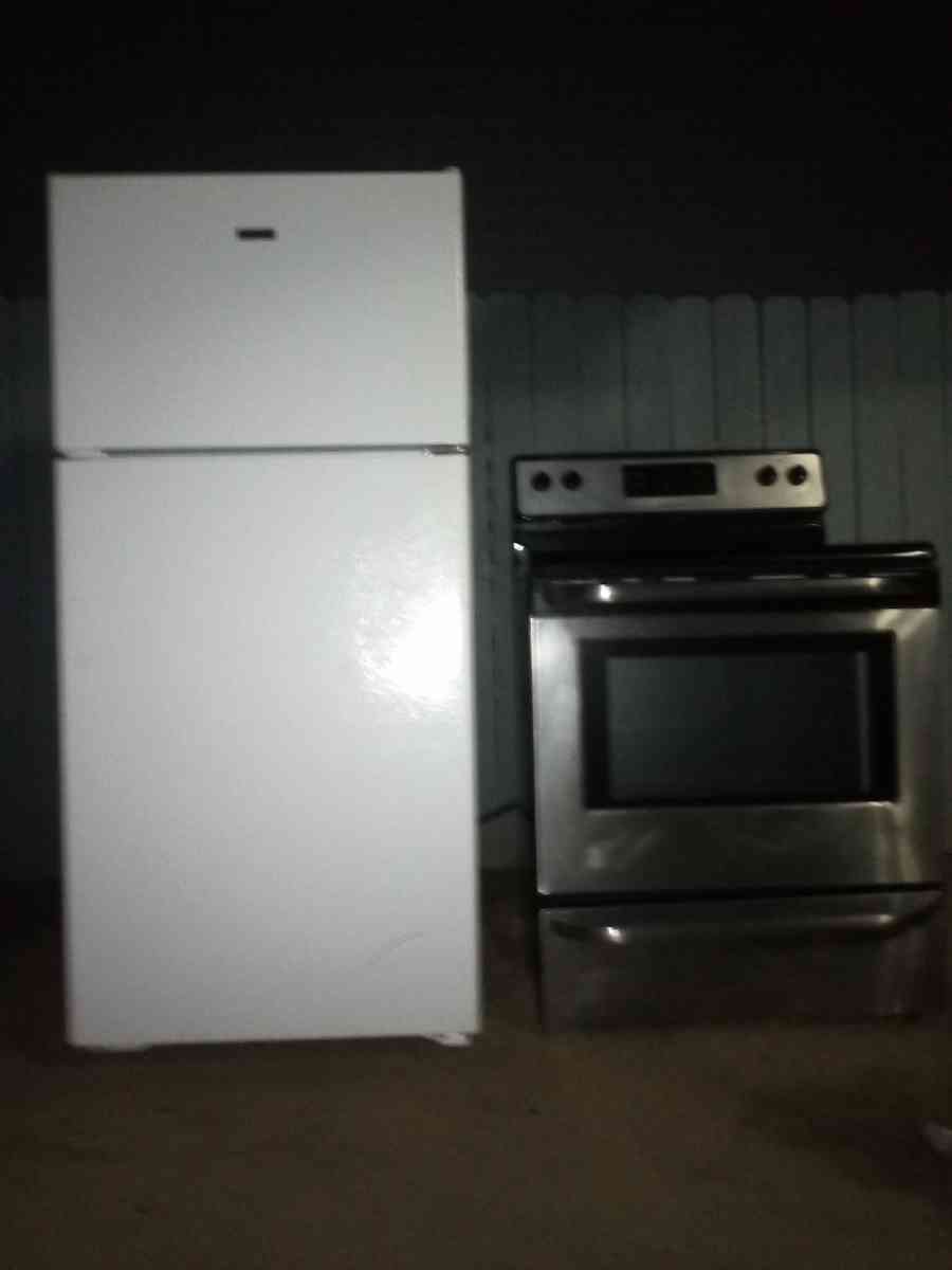 A White Highpoint refrigerator - Monroe, Louisiana