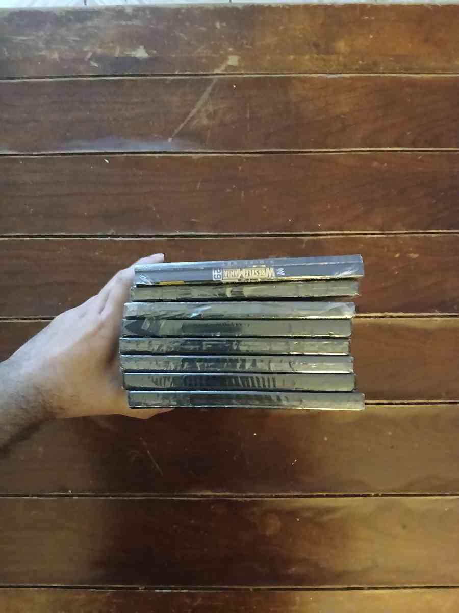 Lot Of 8 WWE And TNA DVDs - North Hollywood, California - FleaMarketBay