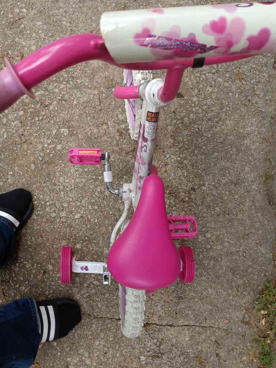 a healthy Barbie pink and white bike with training wheels - Winston Salem, North Carolina - FleaMarketBay