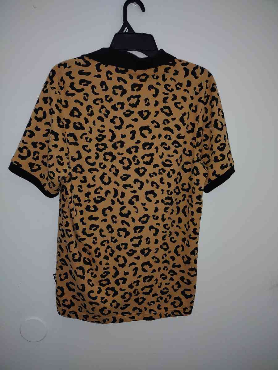 Arthur Ashe Leopard 1968 Tennis Tee - Jacksonville, Florida - FleaMarketBay