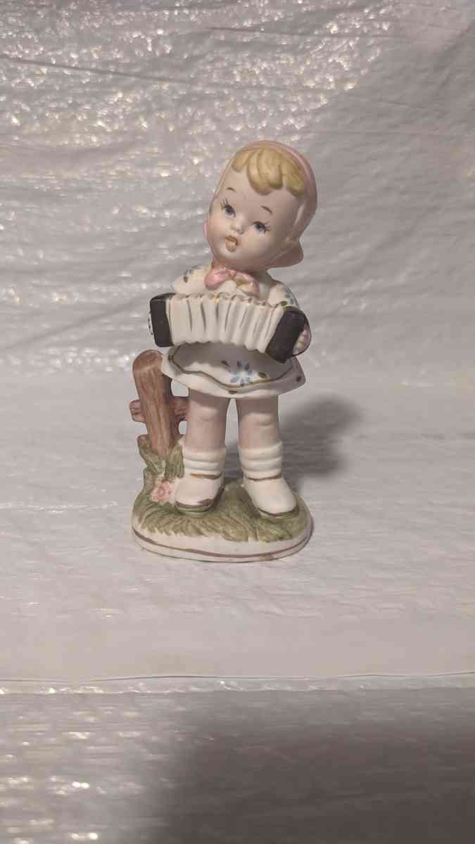 A Little Girl Playing an Accordion with a White Dress - Phoenix, Arizona