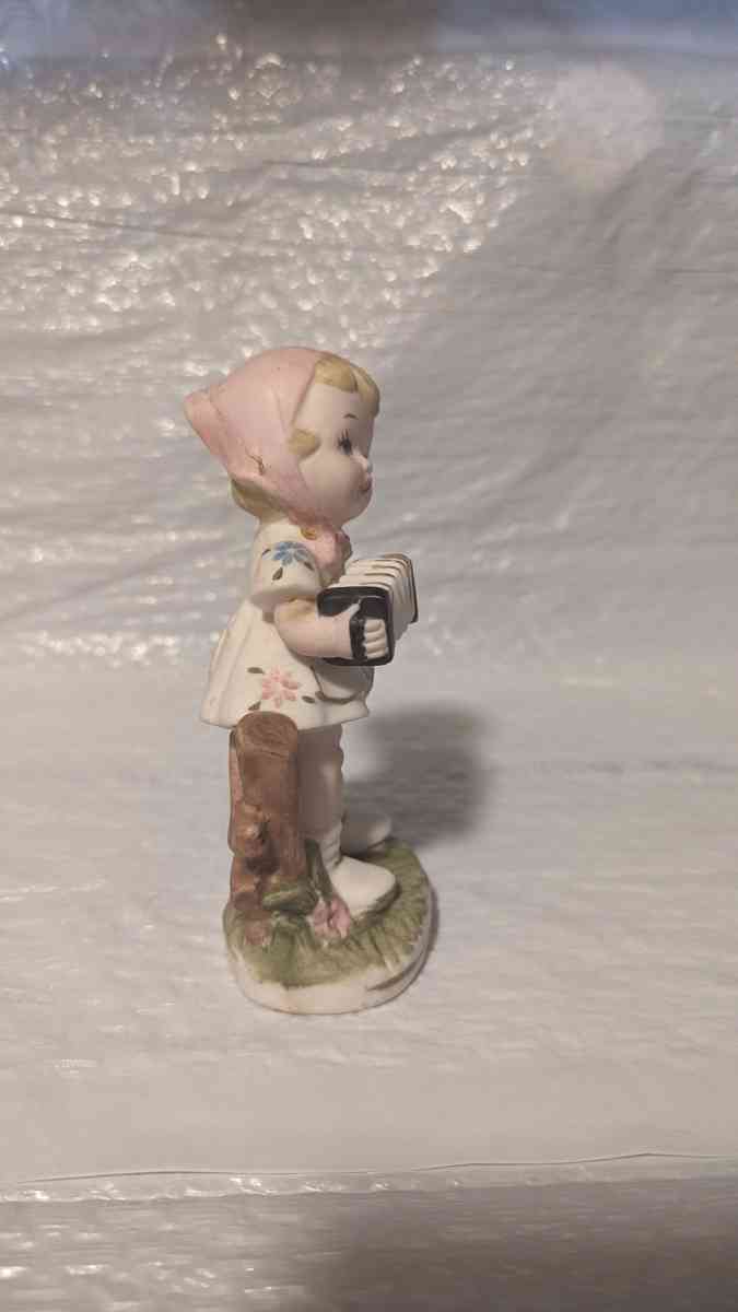 A Little Girl Playing an Accordion with a White Dress - Phoenix, Arizona - FleaMarketBay