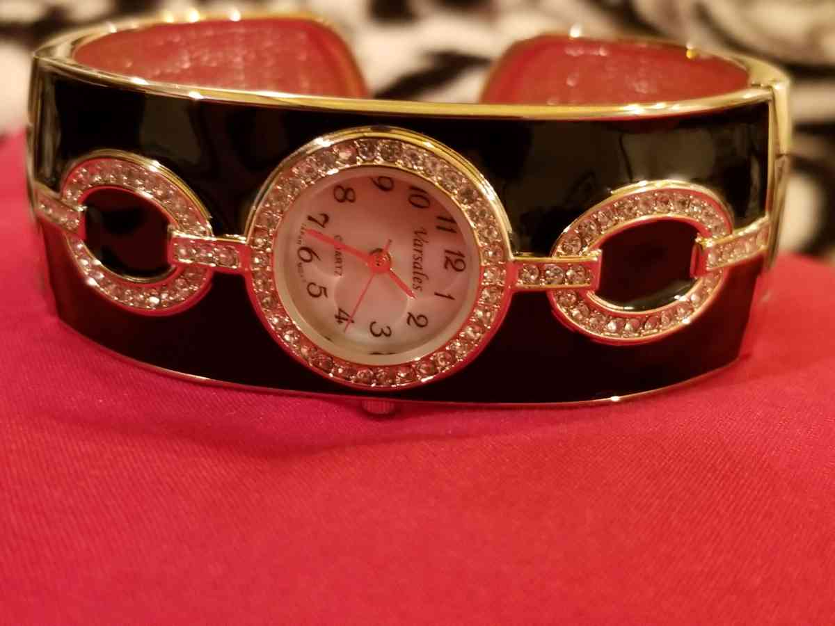 Versales Womens Black and Gold plated watch