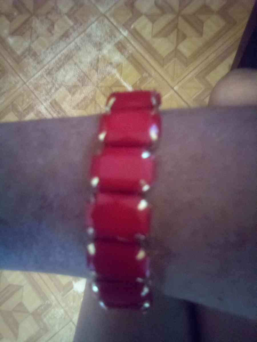 Stretchy gold bracelet with orange stones - Jacksonville, Florida