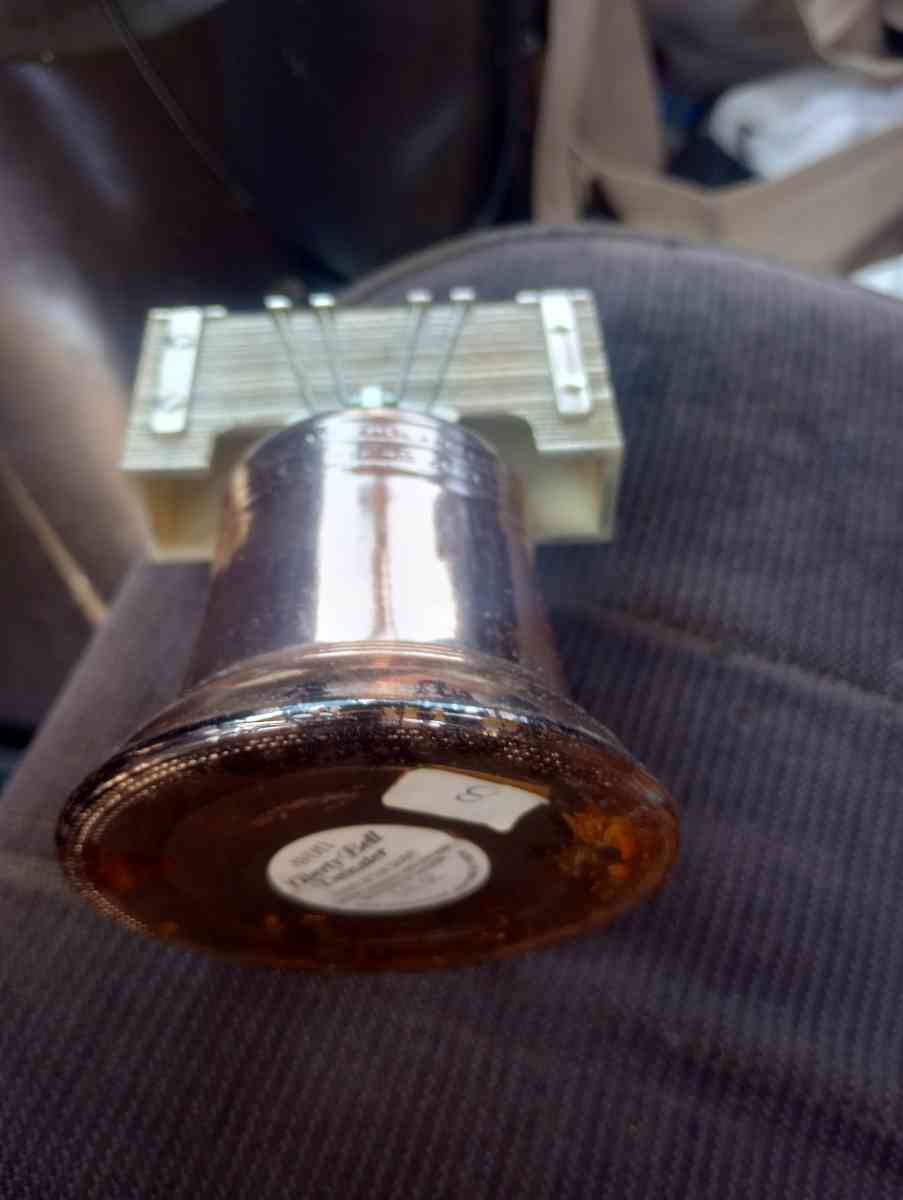 clickers fish scale Avon Liberty container with fluid - Black Hawk, Colorado - FleaMarketBay