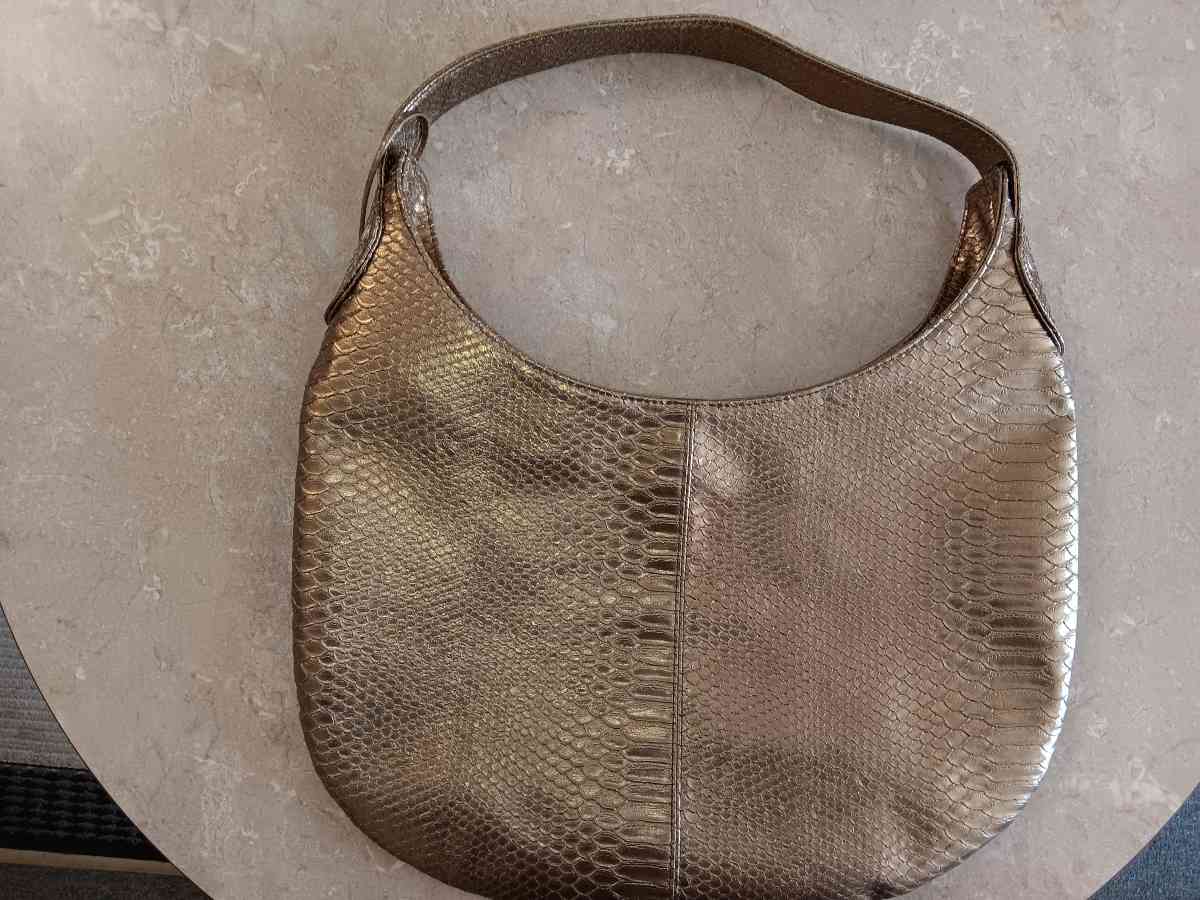 Golden Devi Kroell Purse