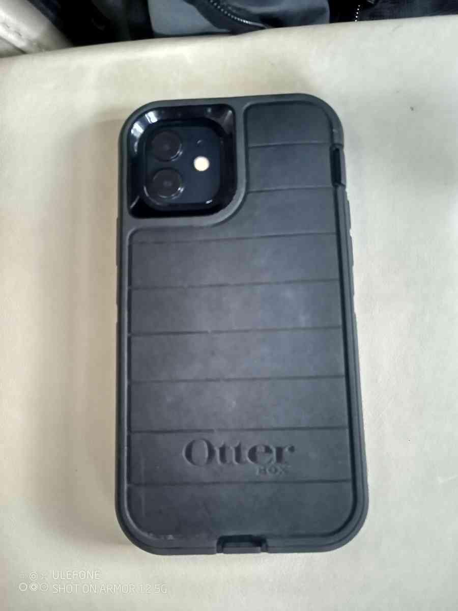 Black iPhone 12 With Black OtterBox Case - Lafayette, Louisiana - FleaMarketBay