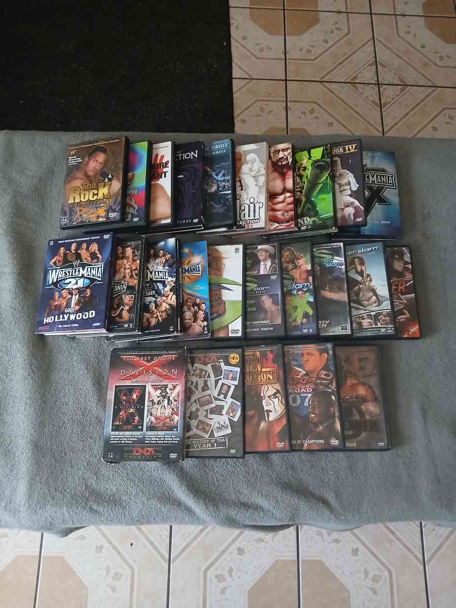 Lot Of 26 WWE And TNA Impact Wrestling DVDs