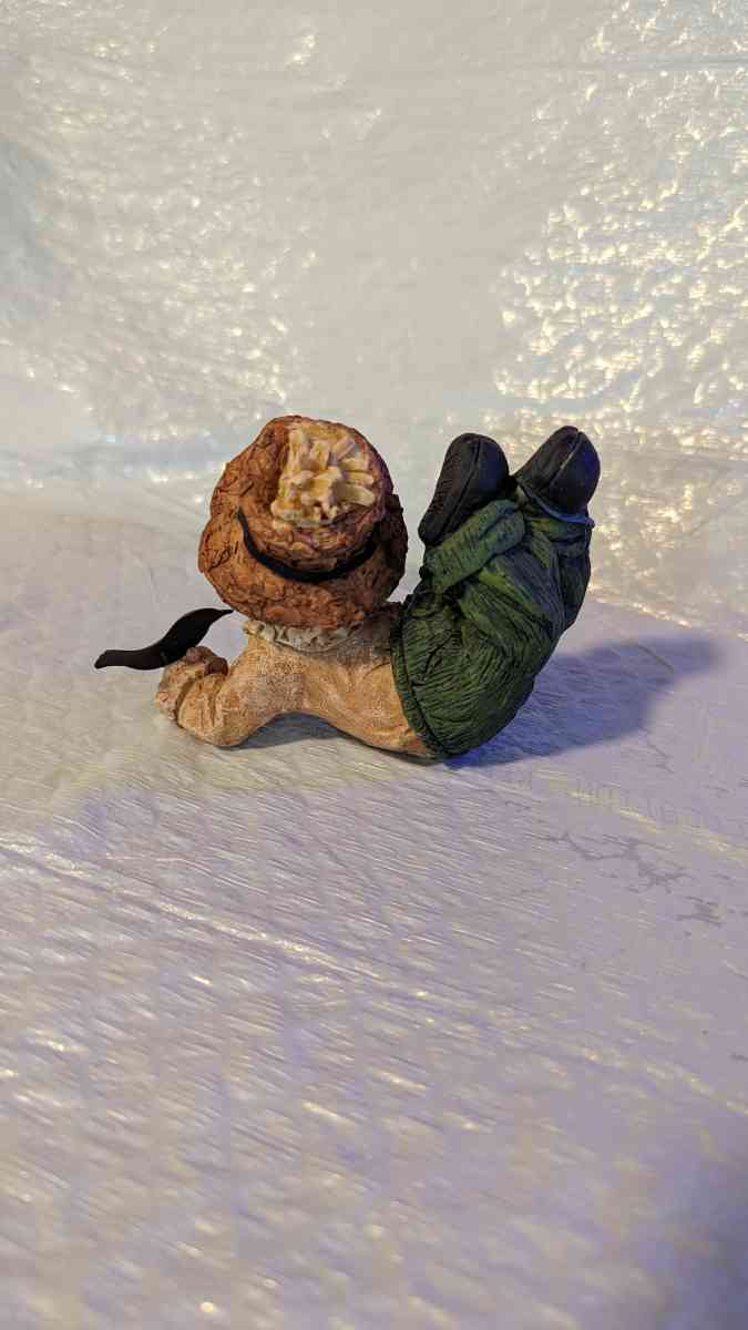 Resin Scarecrow Laying Down With Legs Bent Holding A Crow - Phoenix, Arizona - FleaMarketBay