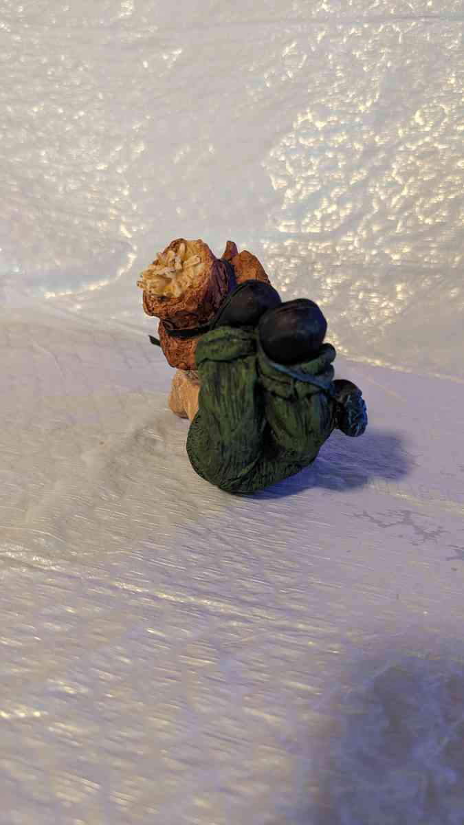 Resin Scarecrow Laying Down With Legs Bent Holding A Crow - Phoenix, Arizona - FleaMarketBay