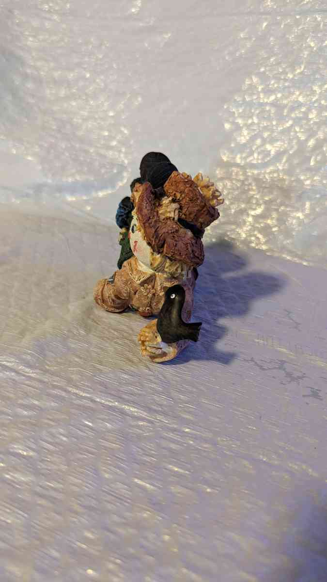 Resin Scarecrow Laying Down With Legs Bent Holding A Crow - Phoenix, Arizona - FleaMarketBay