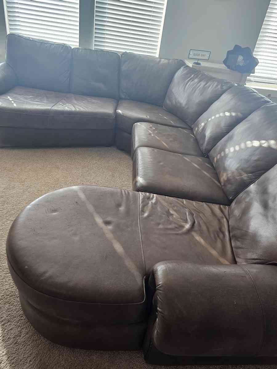 leather sofa with matching chair and ottoman