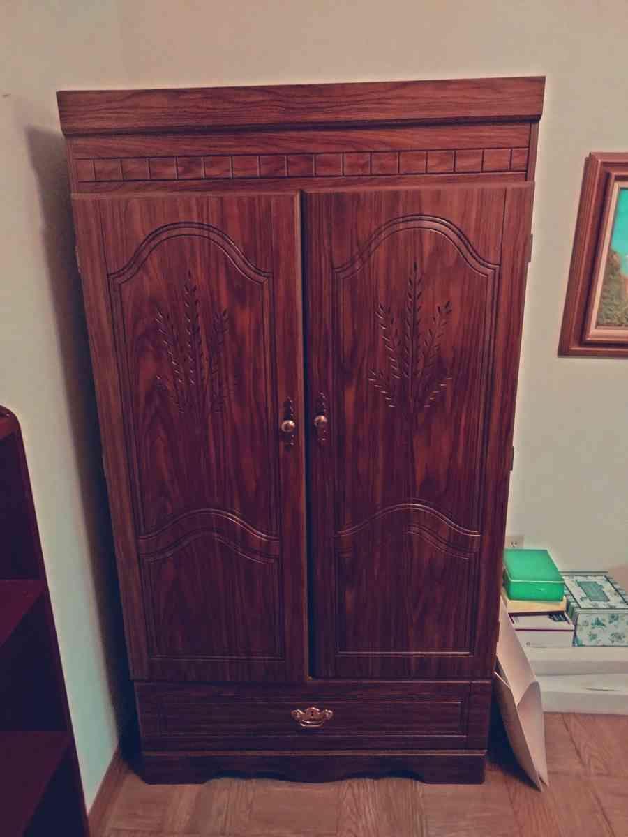 wooden armoire closet