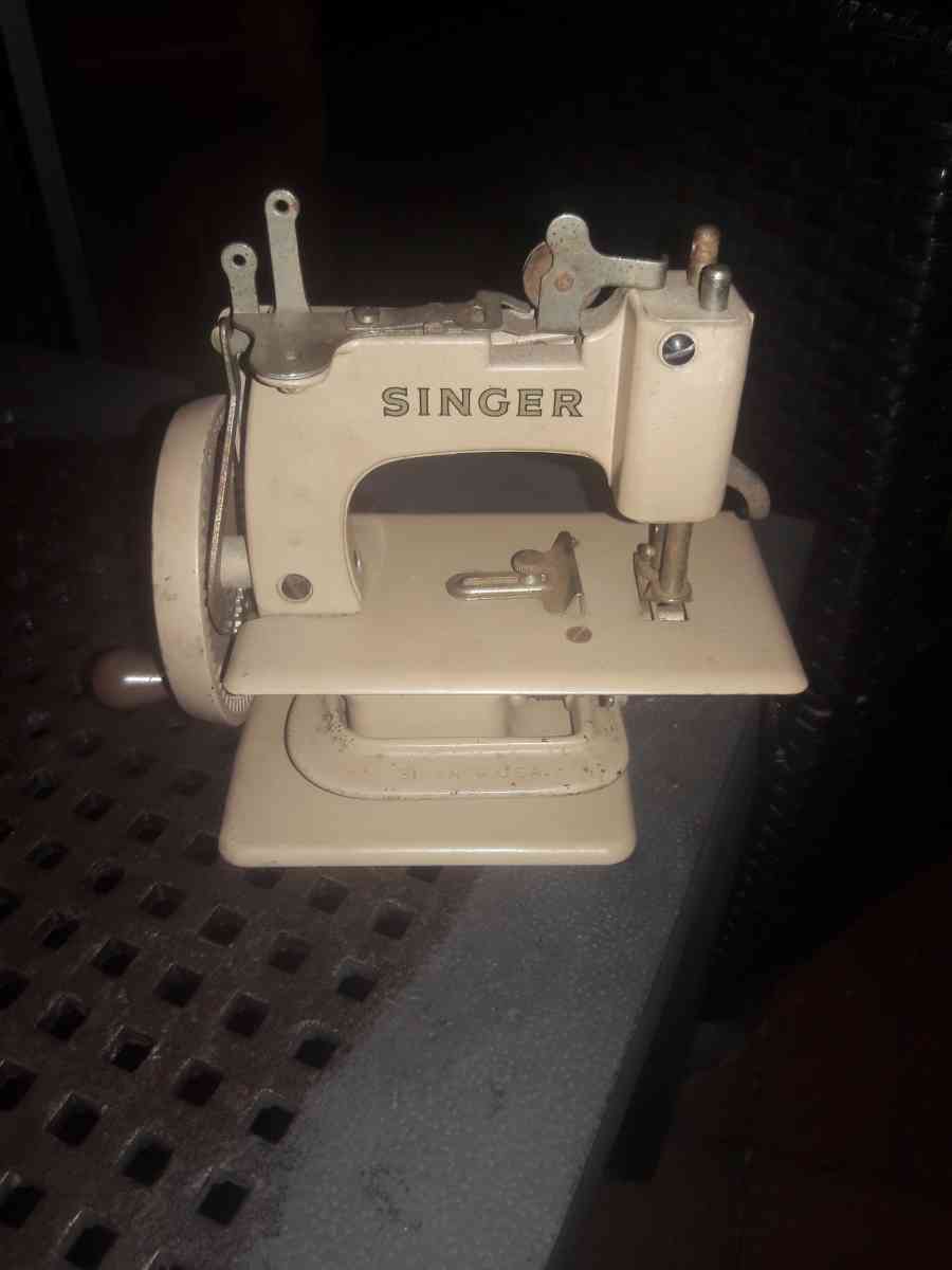 Singer 1950s handheld sew machine - Fort Mill, South Carolina