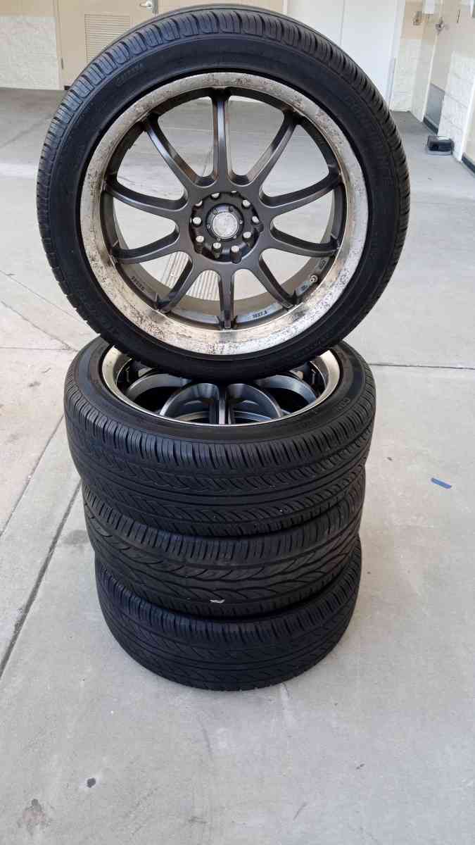 the set of 4 tires wheels R 18