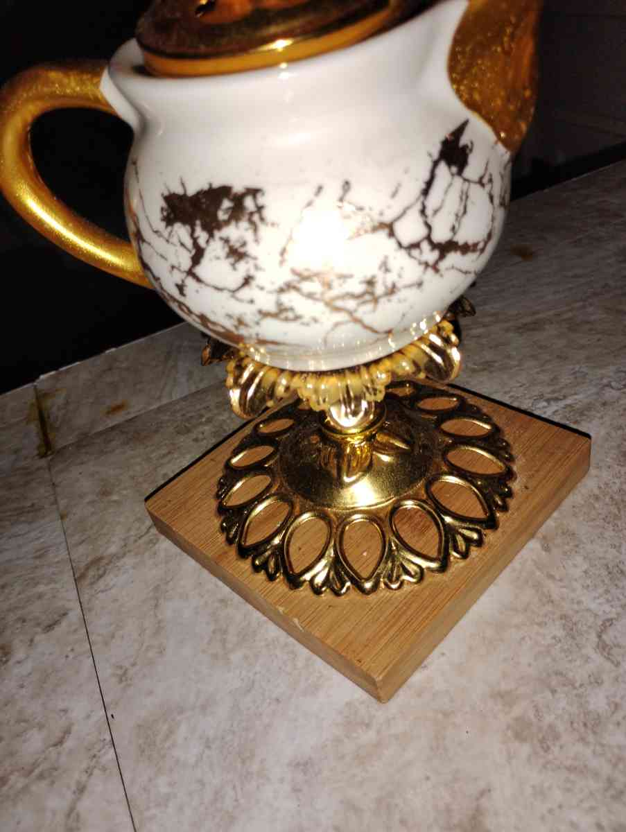 gold and white teacup - Saint Joseph, Missouri