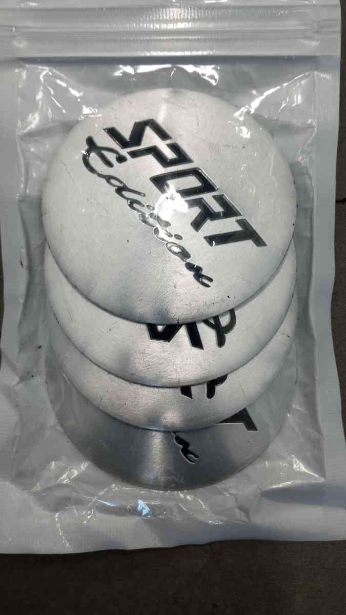 the new set of the 4 caps center sport - Belmont, California