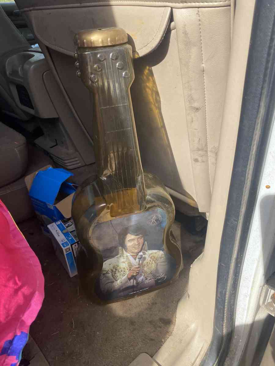 Elvis change container - Halls, Tennessee