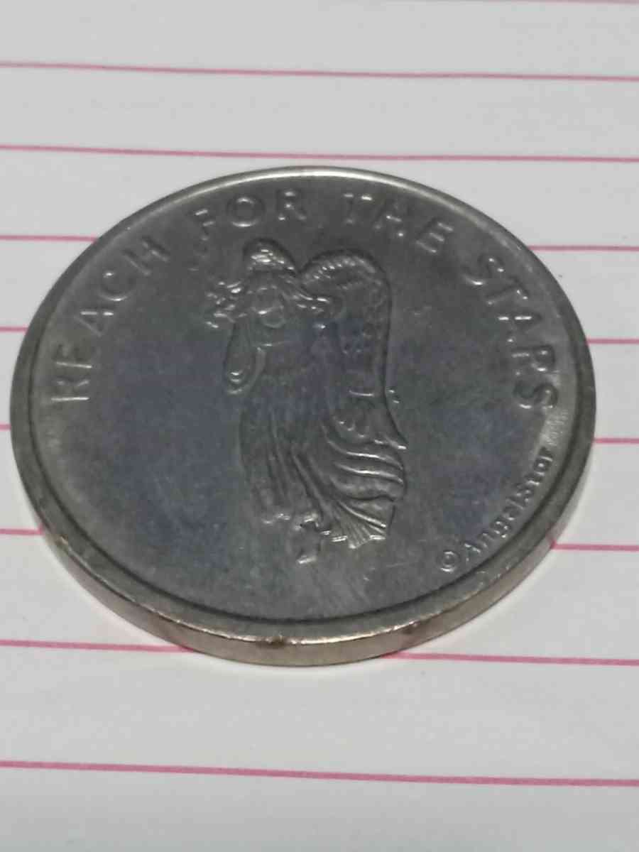metal coin with  woman on it - Brentwood, California