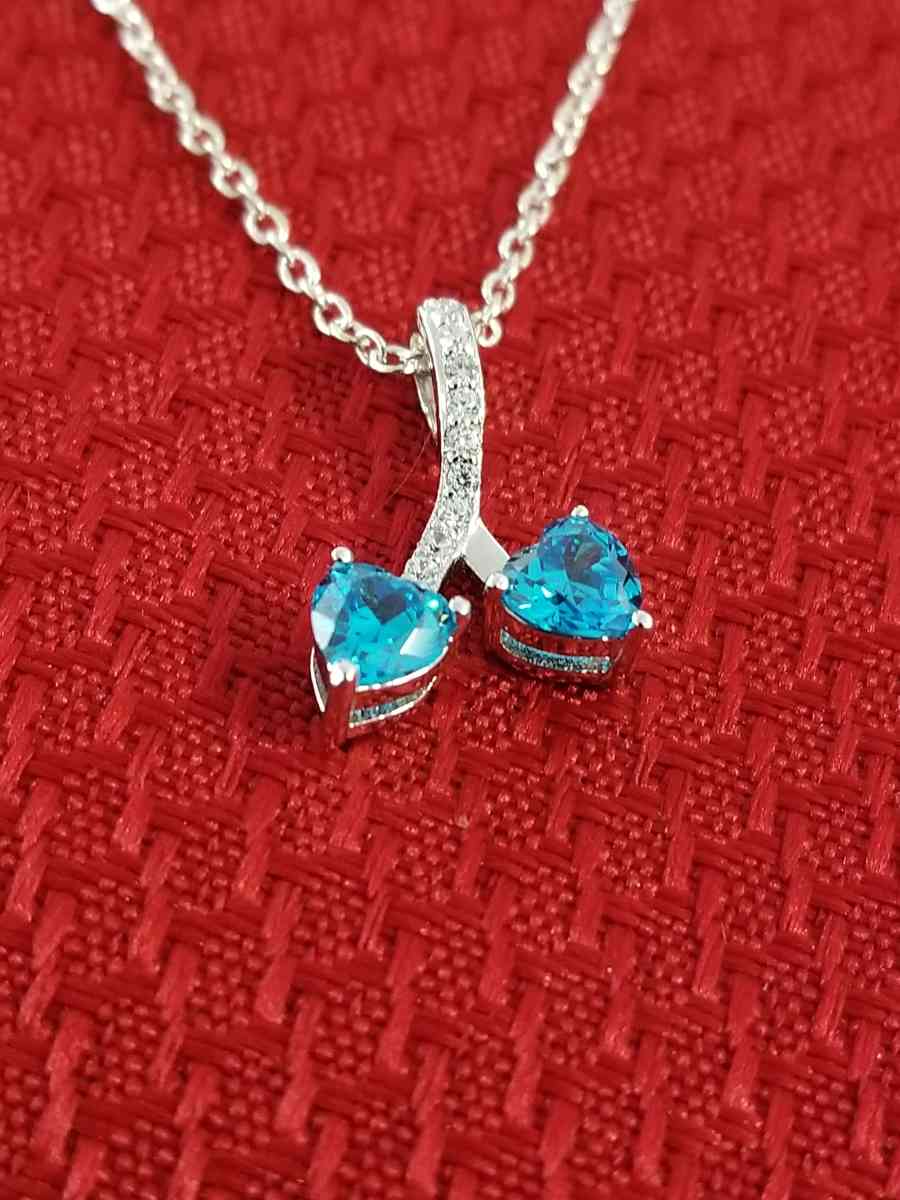 Sterling Silver blue Topaz and cz pendant