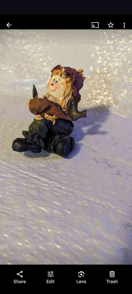 Resin Playful Scarecrow Laying On His Stomach With A Black C - Phoenix, Arizona