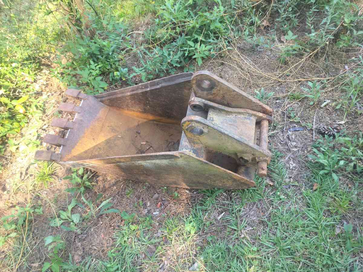 A Bulldozer and excavator Bucket