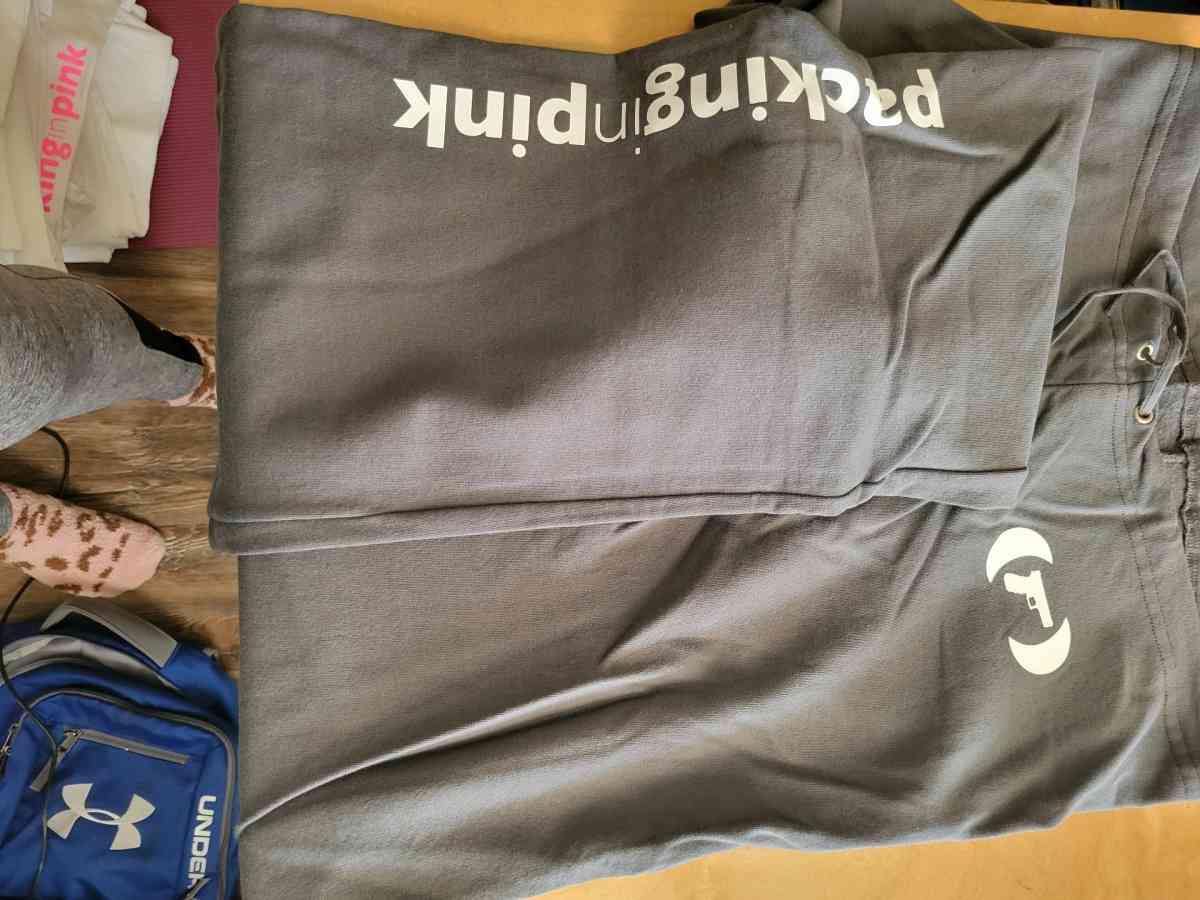 packing in Pink Sweat Pants - Norman, Oklahoma - FleaMarketBay