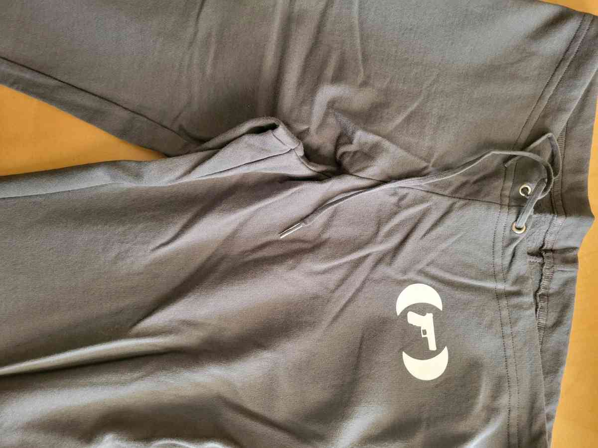 packing in Pink Sweat Pants - Norman, Oklahoma - FleaMarketBay