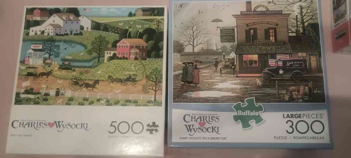 charles wysocki puzzles I have 20 of them all the pieces - Kalamazoo, Michigan - FleaMarketBay