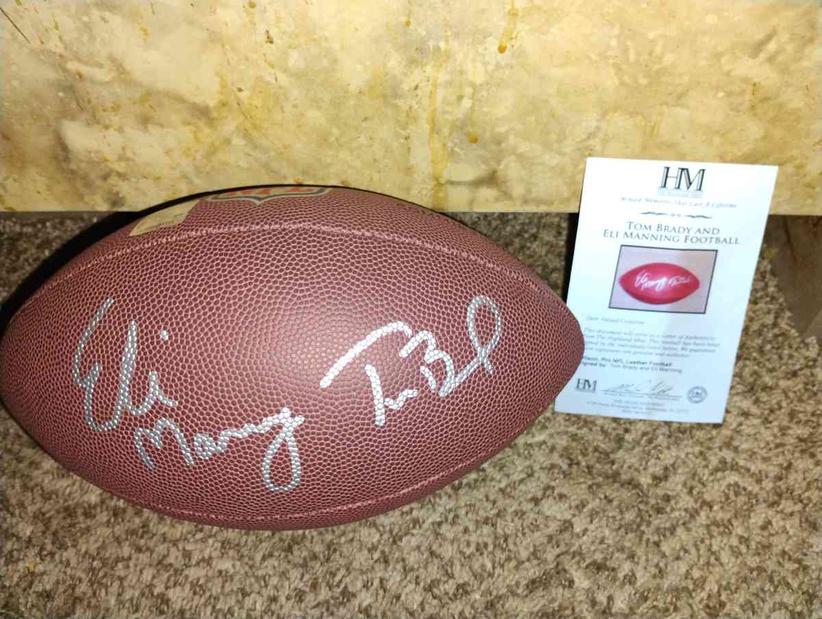 Tom Brady and Eli Manning signed football - Clinton Township, Michigan