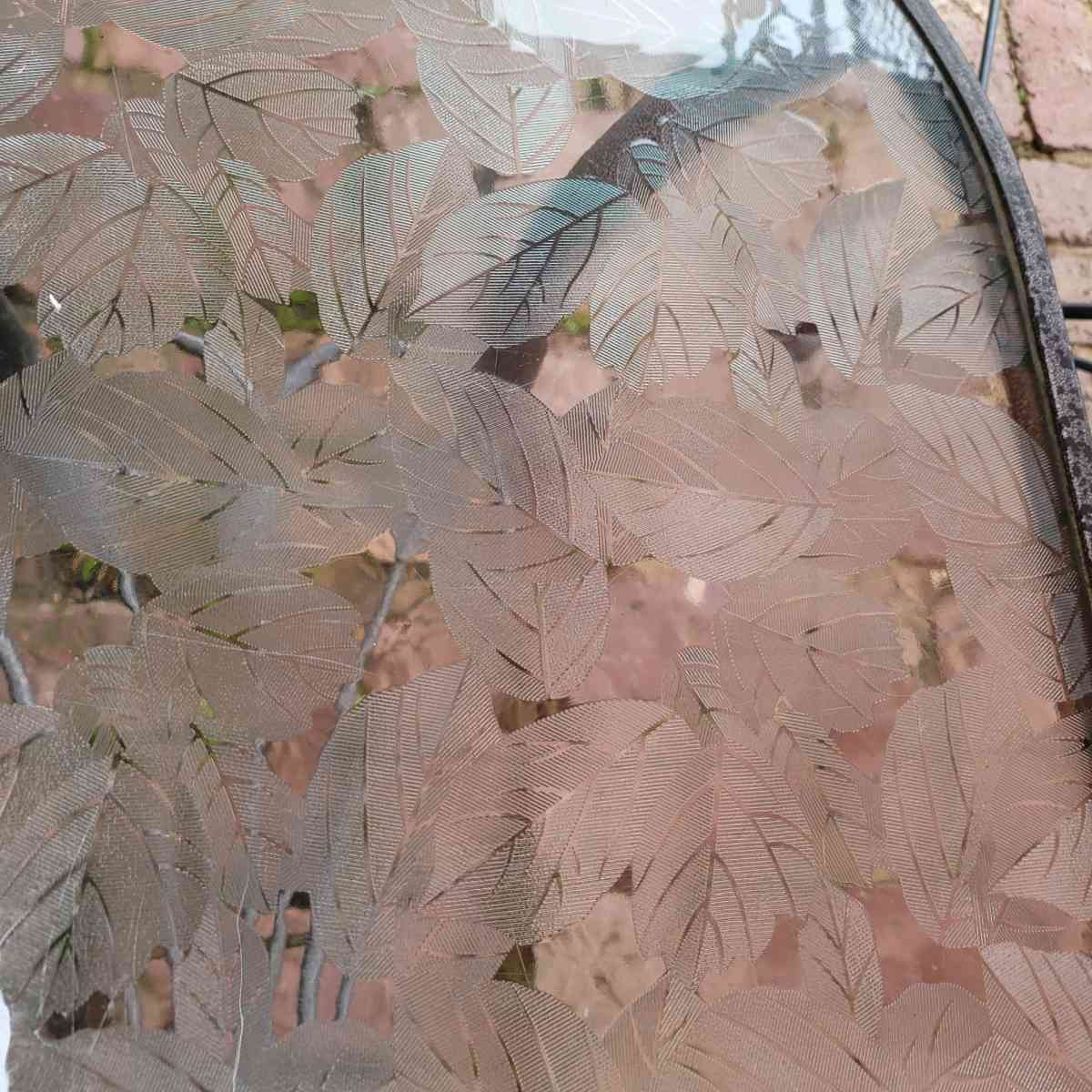 Oval outdoor glass coffee table with metal trim - Shreveport, Louisiana - FleaMarketBay