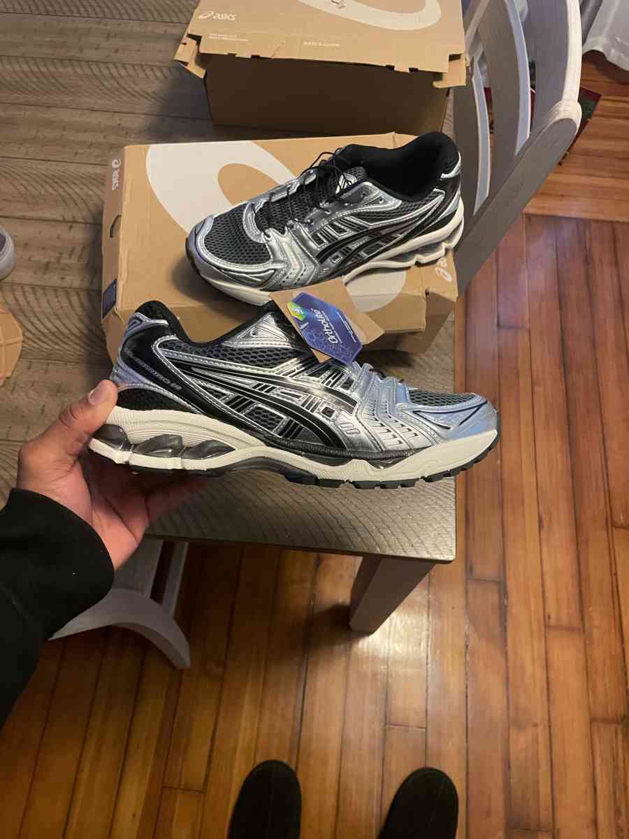 ASICS Kayano 14 in black and silver size 8