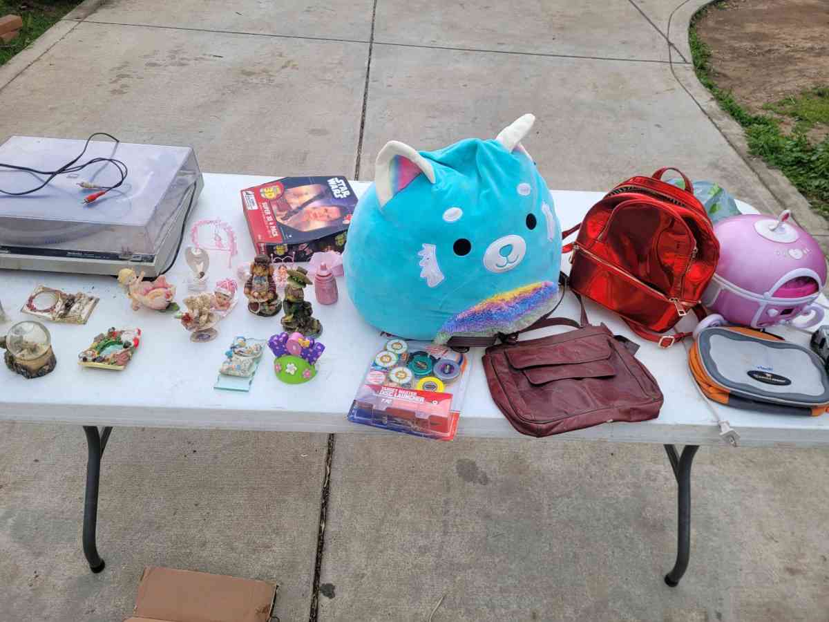 Garage Sale Items Assorted items including plush toypackpack